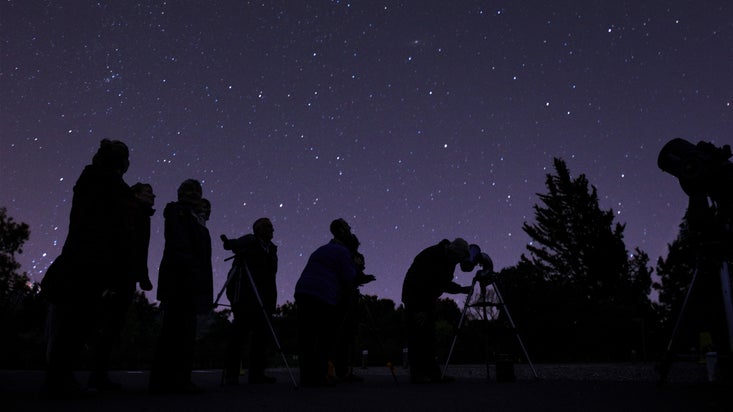 Visitors enjoying one of Bristol Astronomical Society's stargazing evenings at Tyntesfield, North Somerset